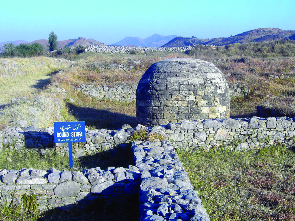 Round Stupa at the Sirkap ancity of Taxila (2nd century BC).