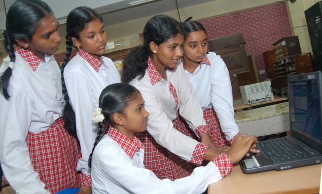 Students at a laptop exhibition in Salem, Tamil Nadu, India.