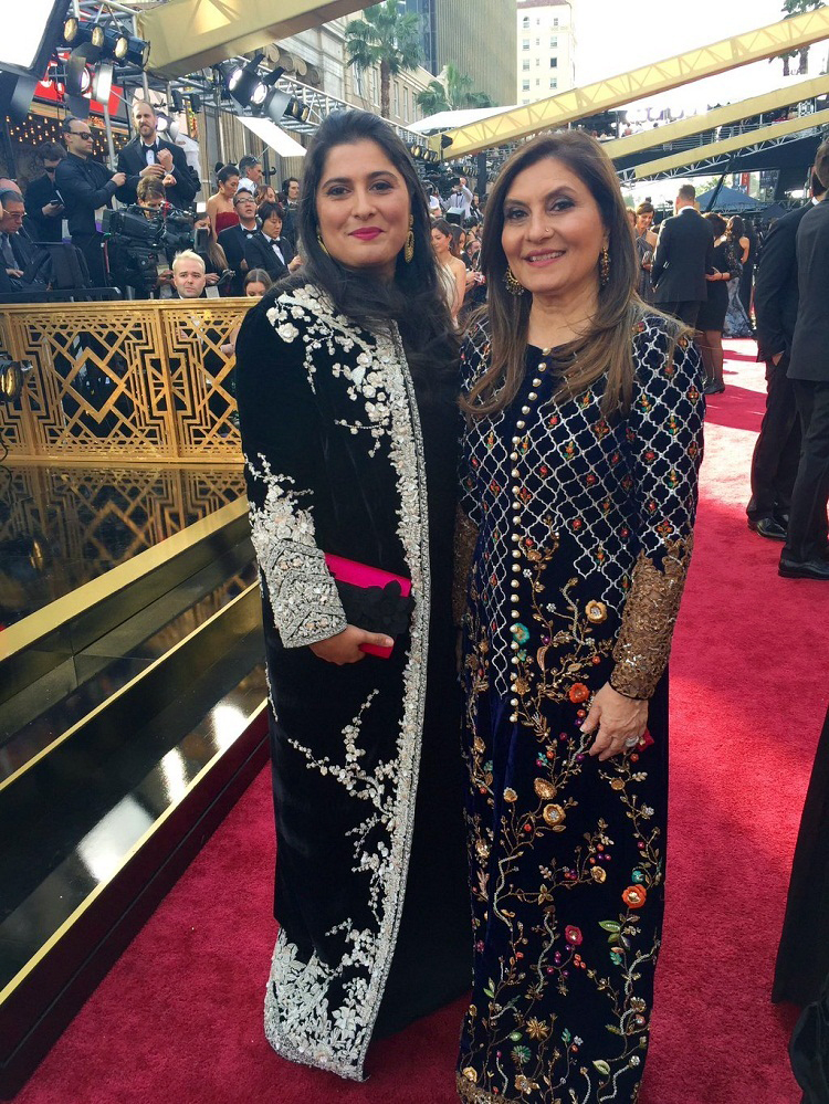 Sharmeen with her mother at Oscar ceremony before taking her second Oscar award. Wearing a traditional black gown, she came to receive her award in an impressive way of an eastern woman. Her gown had a traditional silver embroidery work that is very popular in South Asia and Central Asia. 