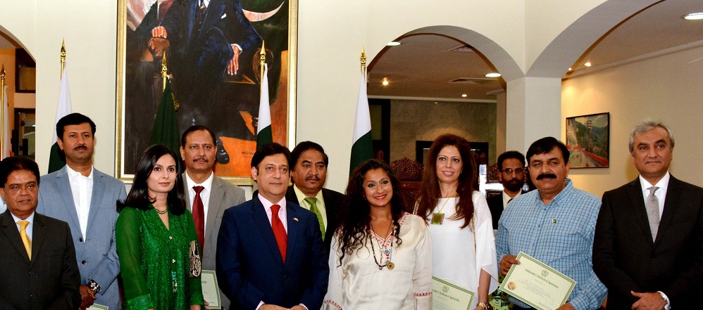 Pakistan’s Ambassador in Bahrain Javed Malik with recipients of "ambassador's appreciation certificate" at the Pakistan Embassy in Bahrain